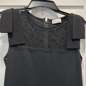 Red Valentino Black stretch dress. Excellent condition… wear once. Fits 4 or 6.